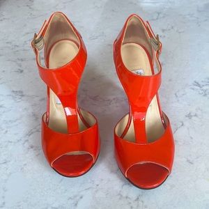 Bright Orange patent leather Jimmy Choo wedges. Worn a few times.